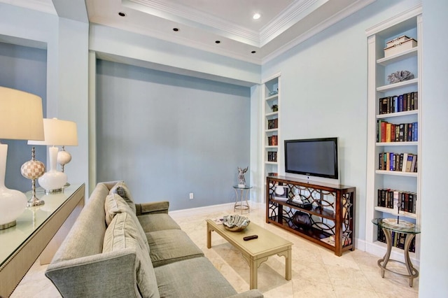 tiled living room with built in shelves, a raised ceiling, and crown molding