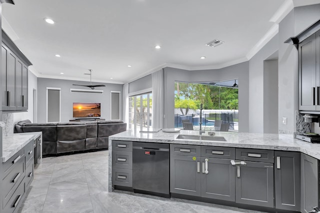 kitchen featuring stainless steel dishwasher, gray cabinets, and light stone counters