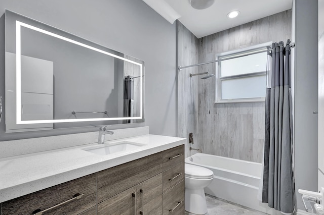 full bathroom featuring shower / bath combination with curtain, vanity, and toilet