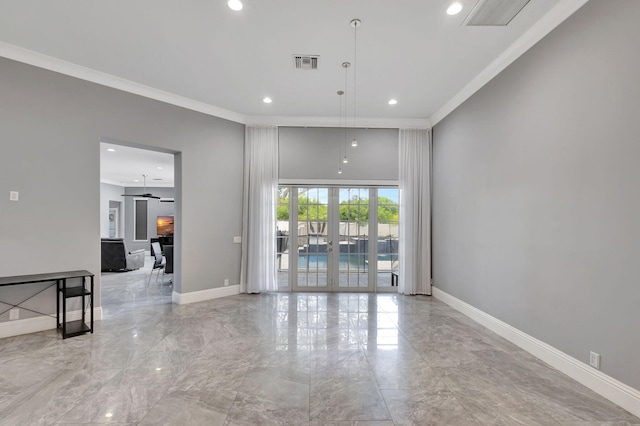 unfurnished room featuring ceiling fan, ornamental molding, and french doors