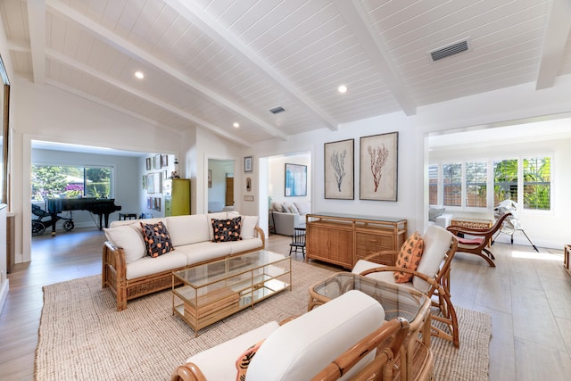 living room featuring wooden ceiling, wood-type flooring, and vaulted ceiling with beams