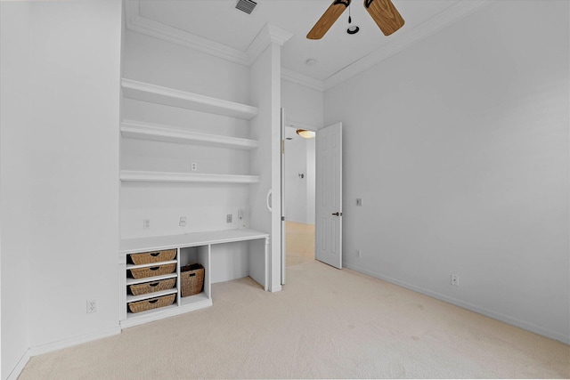 unfurnished bedroom with ceiling fan, a closet, light colored carpet, and ornamental molding