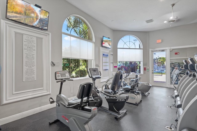 workout area with ceiling fan