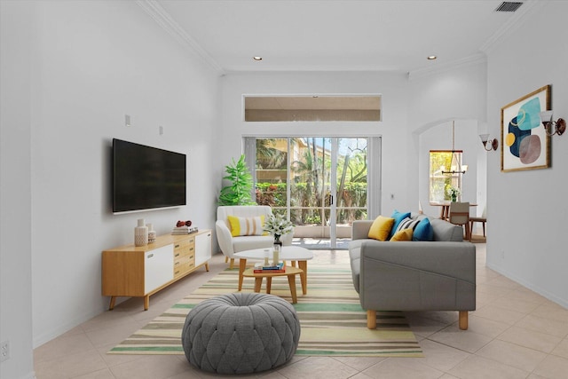 living room with crown molding and light tile patterned floors