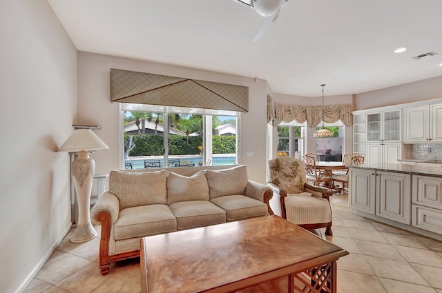 living room with light tile patterned floors