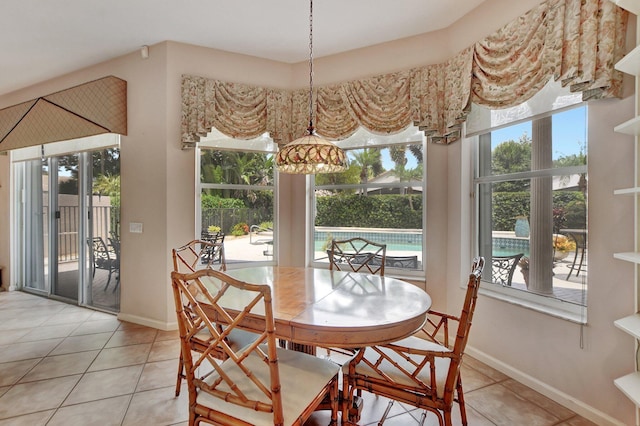 dining room featuring light tile patterned floors