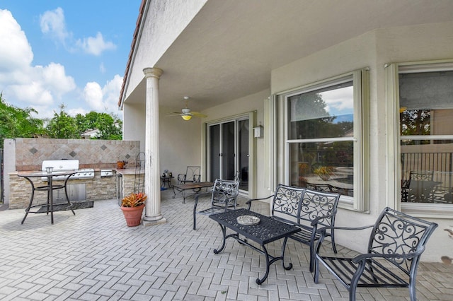 view of patio featuring ceiling fan and area for grilling