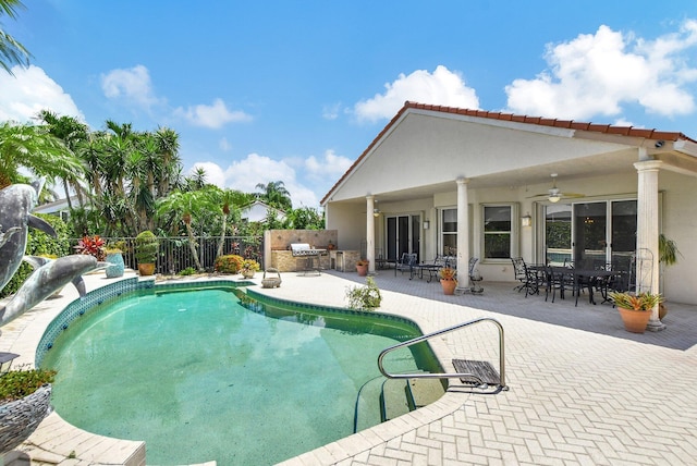 view of pool featuring ceiling fan and a patio