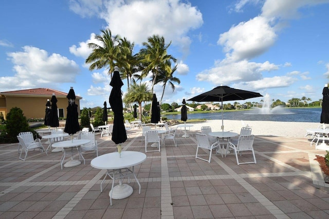 view of patio / terrace with a water view