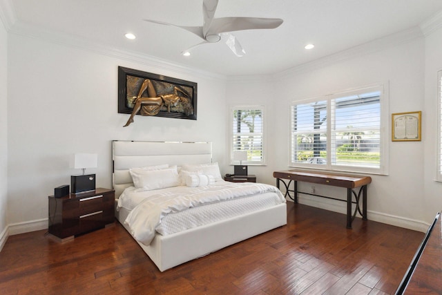 bedroom featuring ceiling fan, ornamental molding, and dark wood-type flooring