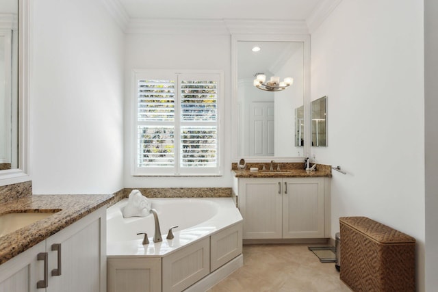 bathroom featuring a tub, ornamental molding, tile patterned floors, and vanity