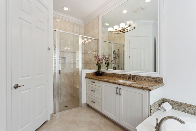 bathroom featuring tile patterned flooring, plus walk in shower, vanity, ornamental molding, and a notable chandelier