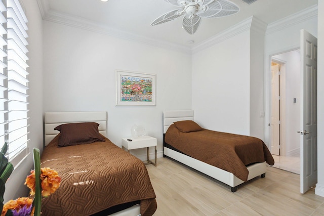 bedroom featuring ceiling fan and crown molding