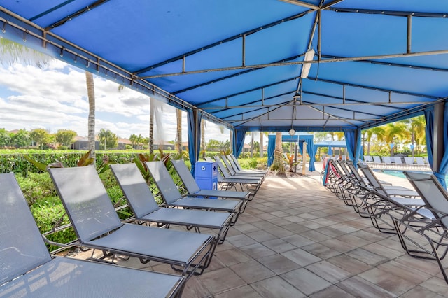 view of patio featuring a community pool