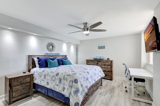 bedroom with light wood-type flooring and ceiling fan