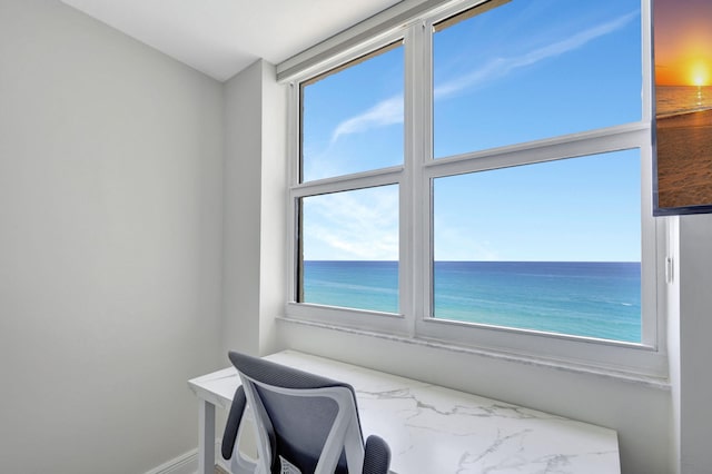 office with a water view and a beach view