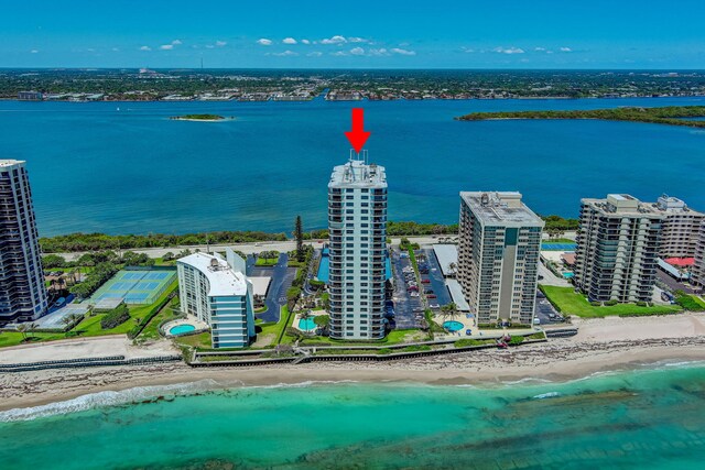 aerial view featuring a water view and a view of the beach