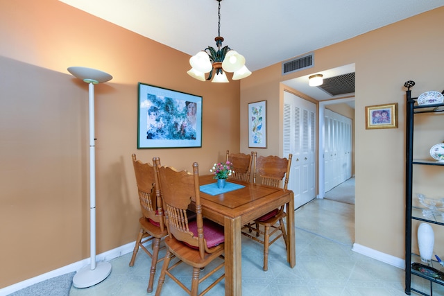 dining room featuring an inviting chandelier