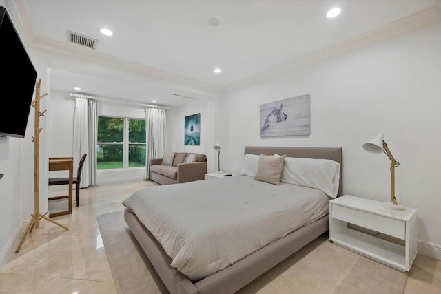 bedroom with crown molding