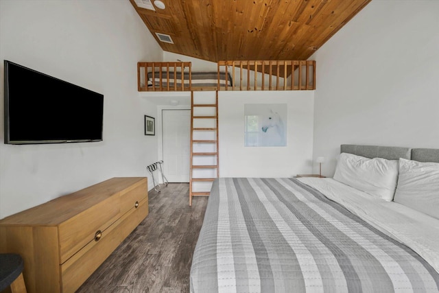 bedroom featuring dark hardwood / wood-style flooring, wood ceiling, and a high ceiling