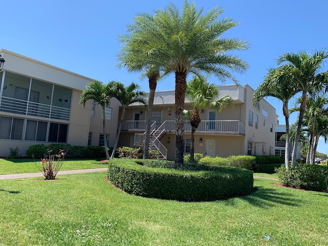 view of property with a lawn