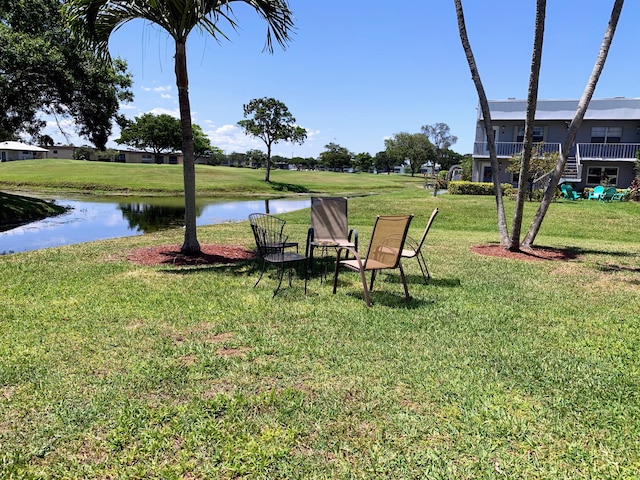 view of yard with a water view