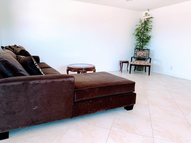 living room with tile flooring