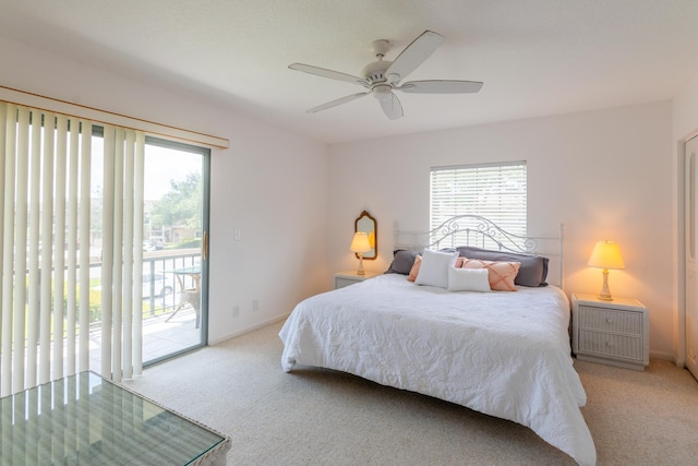 carpeted bedroom with ceiling fan, access to exterior, and multiple windows