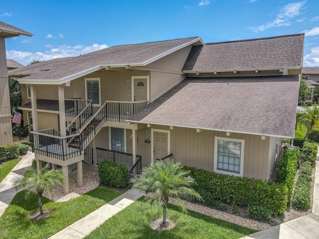 multi unit property featuring a porch