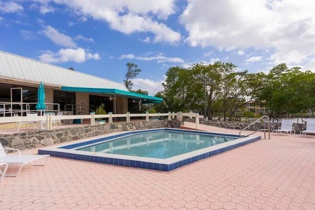 view of pool with a patio area