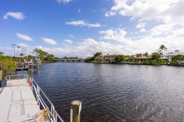 water view featuring a dock