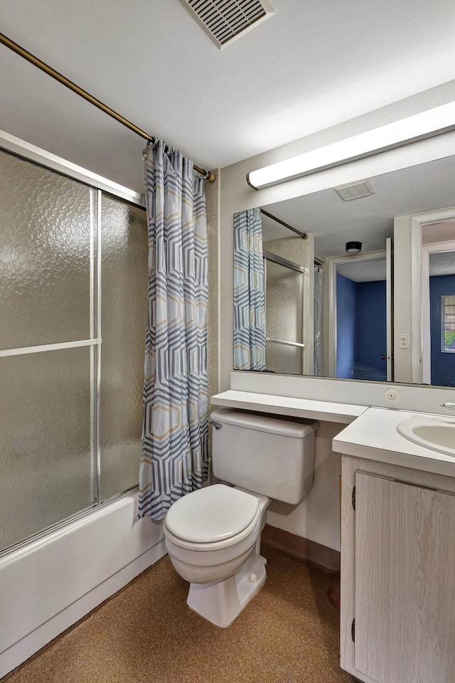 full bathroom with enclosed tub / shower combo, large vanity, and toilet