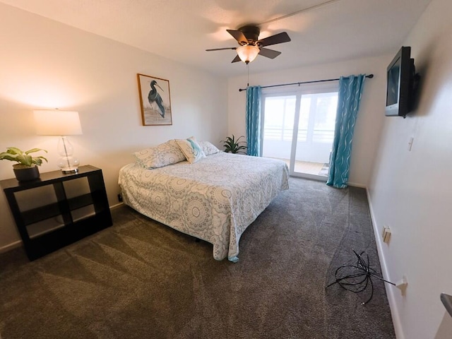 bedroom featuring dark carpet, access to exterior, and ceiling fan