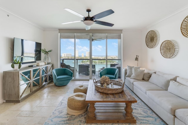 living room featuring ceiling fan and crown molding