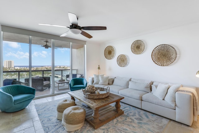 living room featuring a wall of windows and crown molding