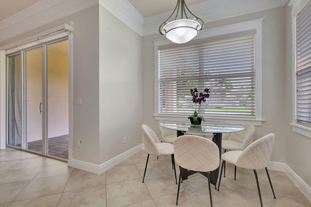 dining space featuring light tile patterned floors and ornamental molding