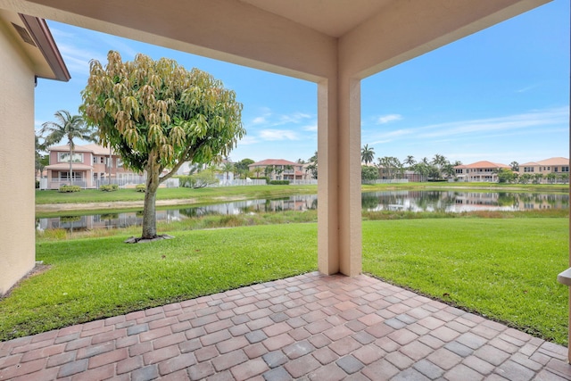 view of patio / terrace featuring a water view