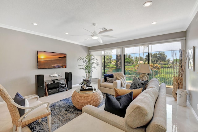 living room with a textured ceiling, ceiling fan, and crown molding