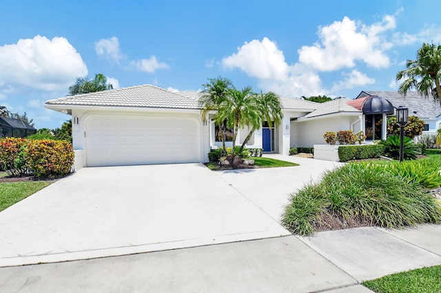 view of front of home with a garage