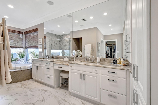 bathroom with vanity, plus walk in shower, and crown molding