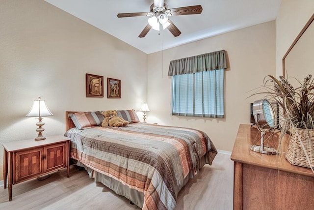 bedroom featuring ceiling fan and light wood-type flooring