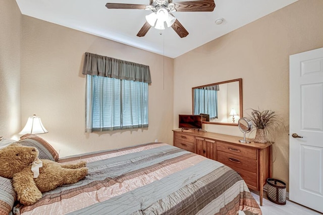 bedroom featuring ceiling fan