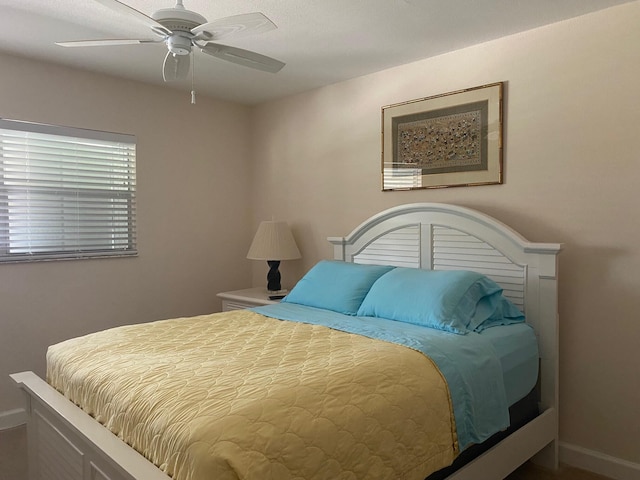 bedroom featuring ceiling fan