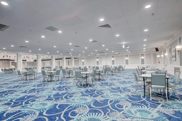 dining area featuring carpet flooring