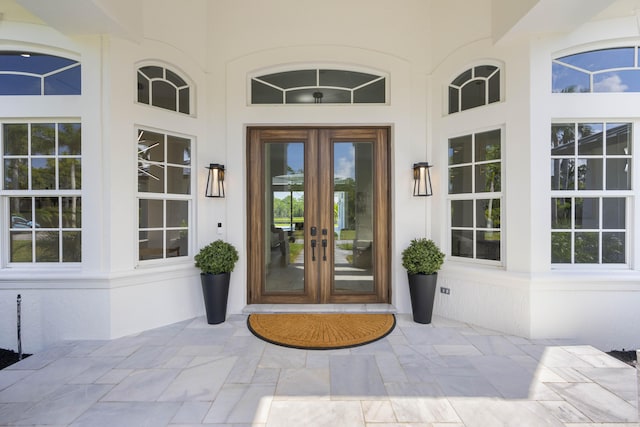 property entrance featuring french doors