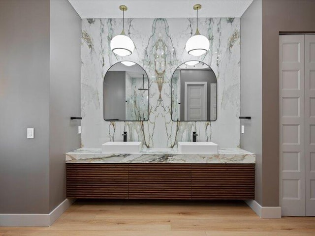 bathroom featuring wood-type flooring and vanity