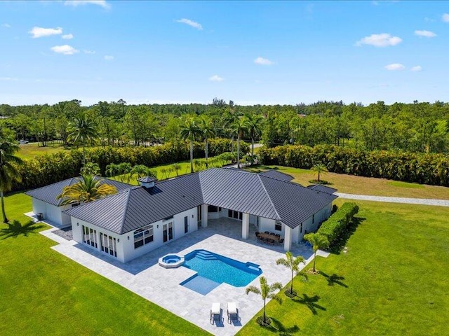 exterior space with a lawn and a patio