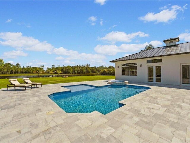 view of pool featuring an in ground hot tub, french doors, a yard, and a patio area