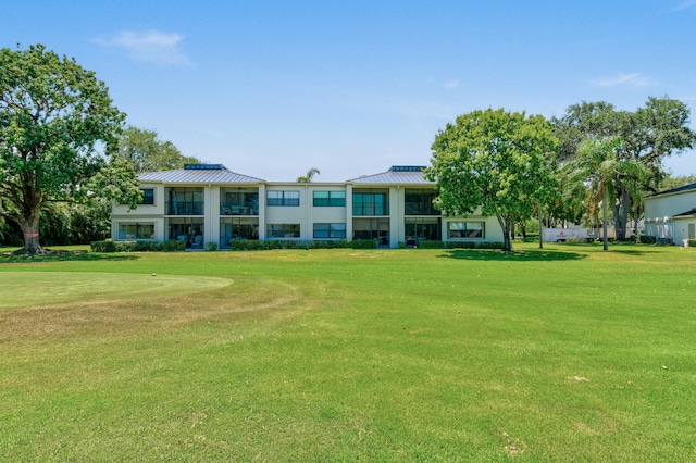 exterior space featuring a lawn