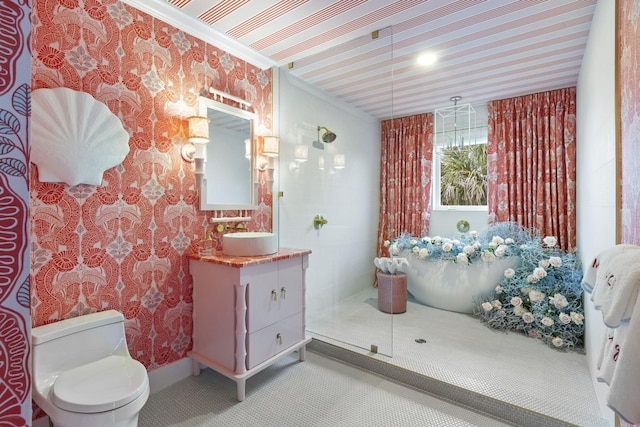 bathroom featuring vanity, crown molding, and toilet